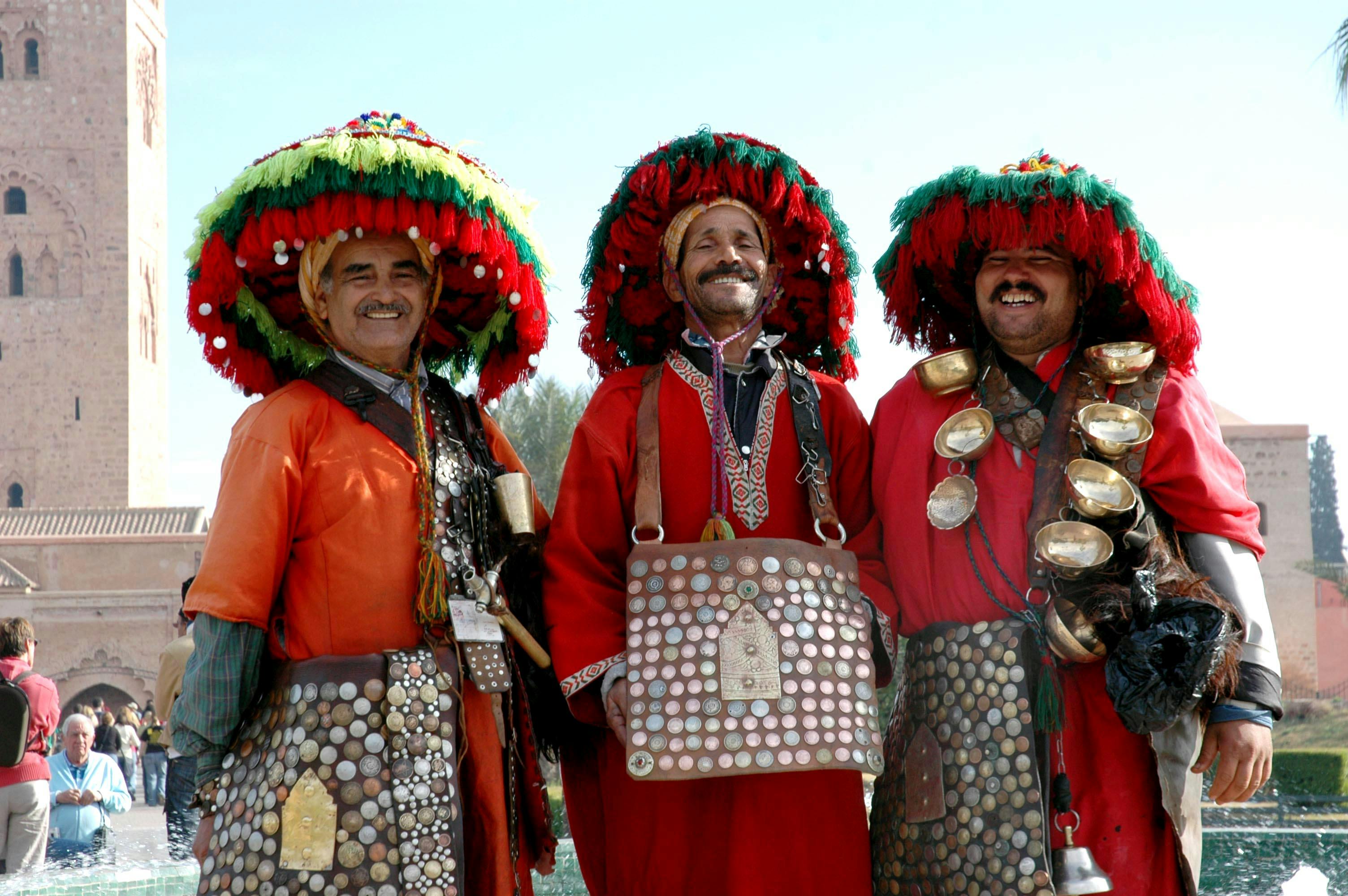 Free Men Posing Together in Traditional Clothing Stock Photo