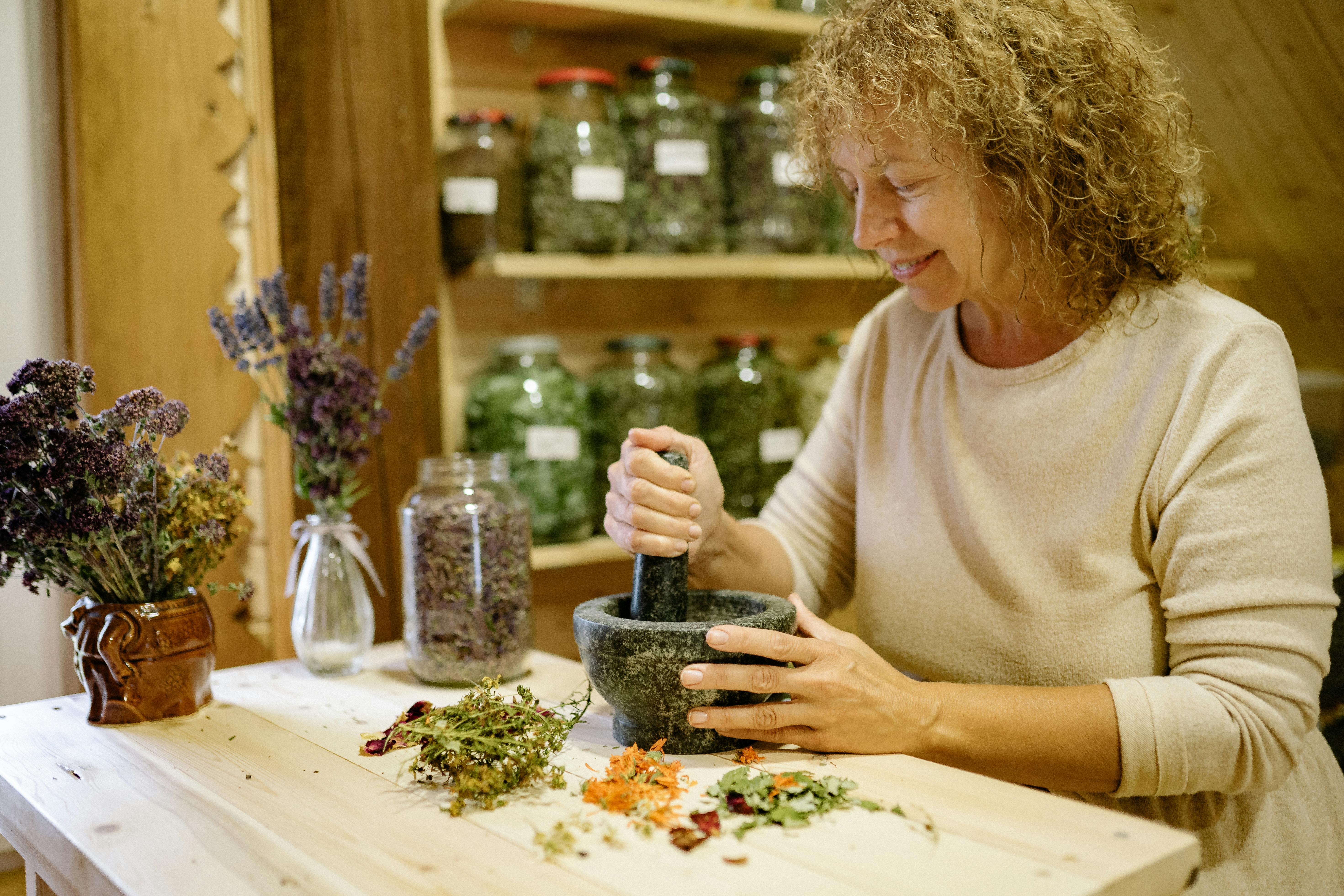 Free Smiling Florist with Flowers Stock Photo